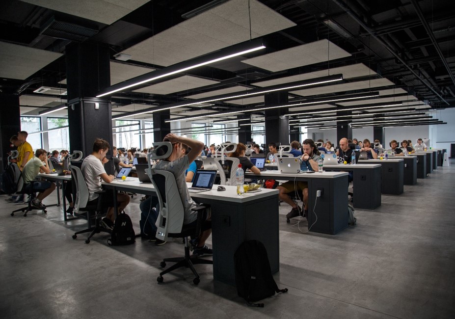 A digital office with a group of people working